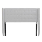 Tête de lit Kendrah capitonnée en tissu avec ailes, cloutée, réglable, format grand lit/très grand lit, par