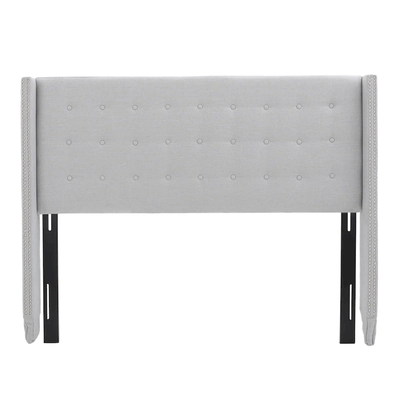 Tête de lit Kendrah capitonnée en tissu avec ailes, cloutée, réglable, format grand lit/très grand lit, par