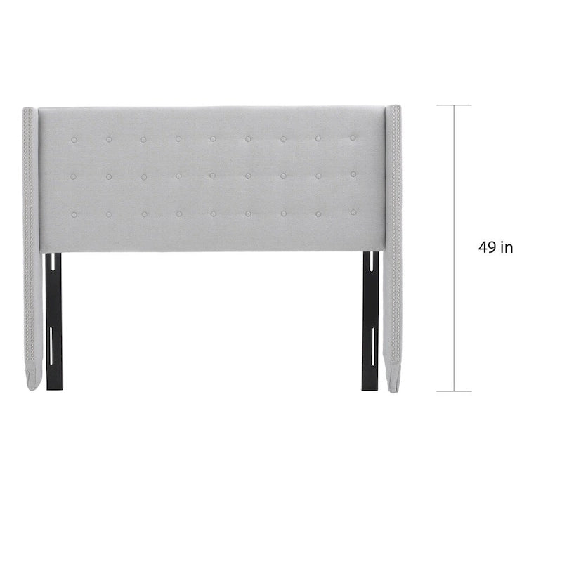 Tête de lit Kendrah capitonnée en tissu avec ailes, cloutée, réglable, format grand lit/très grand lit, par