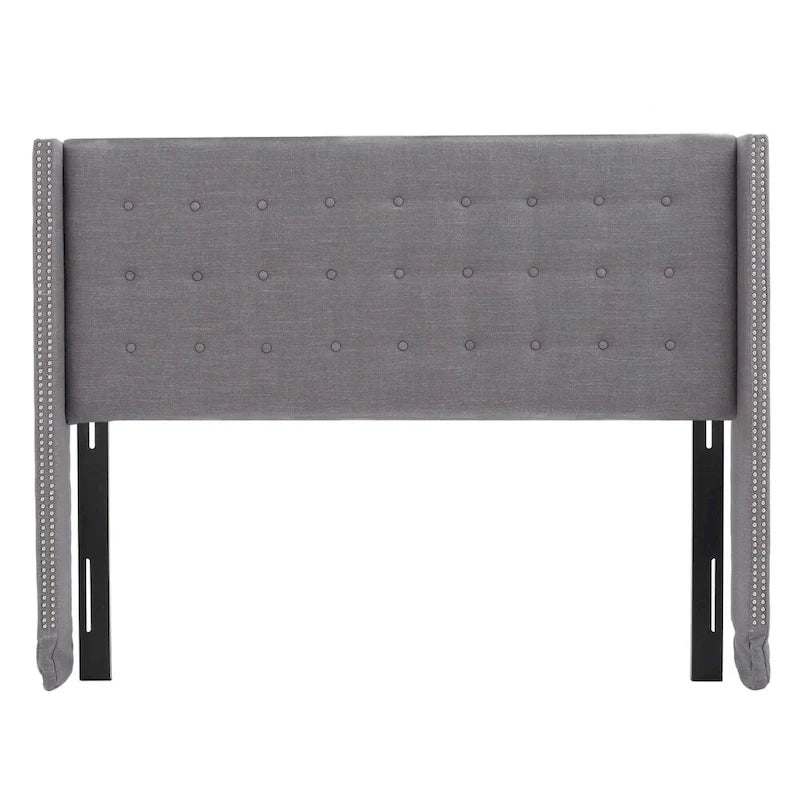 Tête de lit Kendrah capitonnée en tissu avec ailes, cloutée, réglable, format grand lit/très grand lit, par