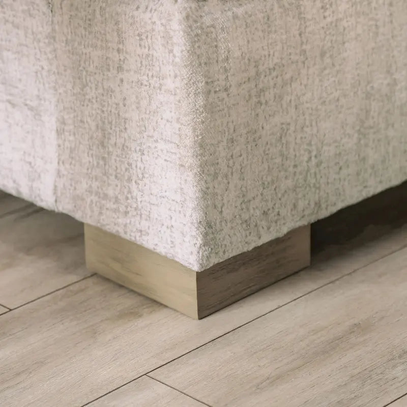 Canapé Nort avec accoudoirs évasés rembourrés en tissu de transition par